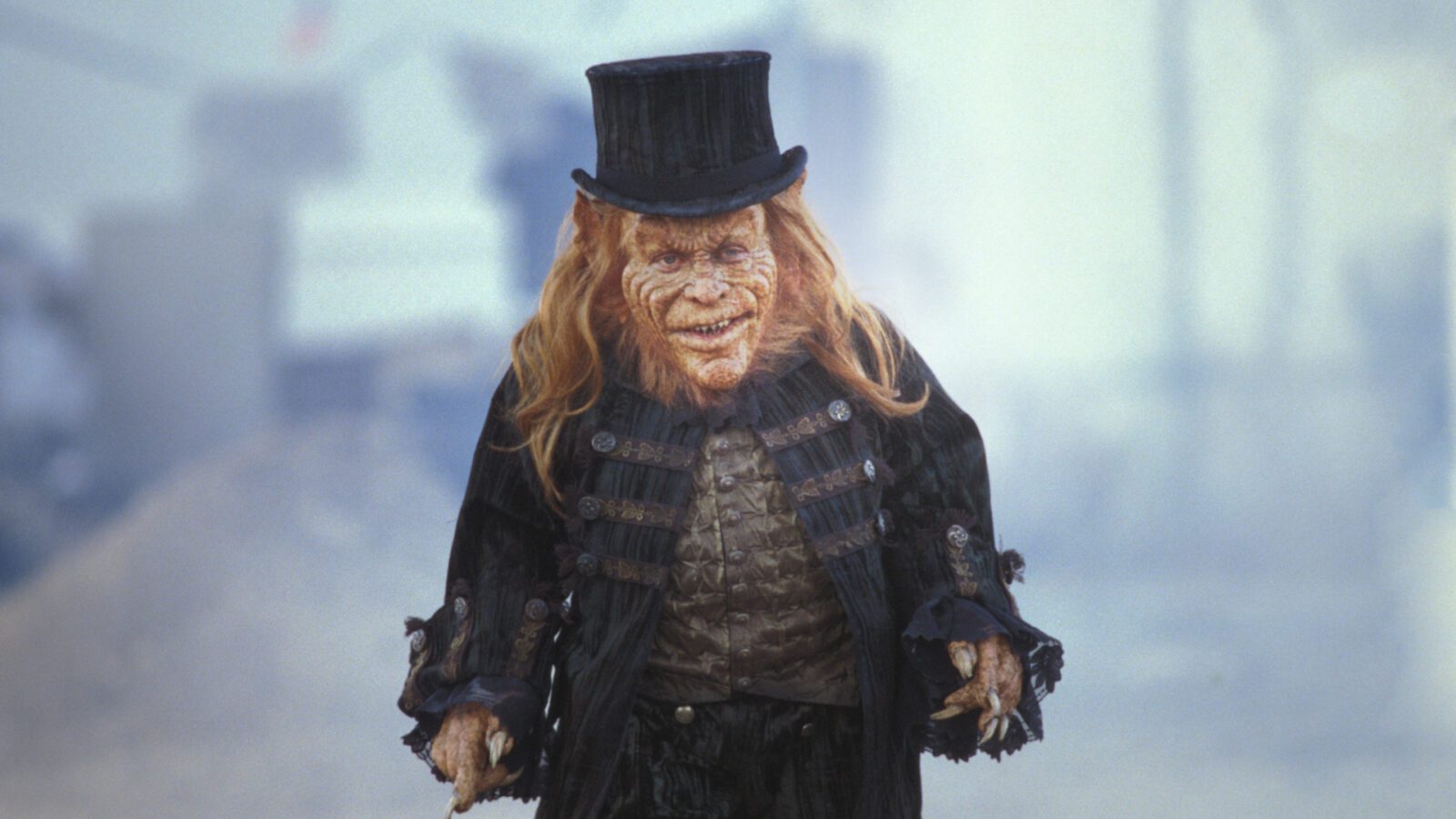 Warwick Davis as the Leprechaun to emphasize how to watch the Leprechaun movies in order.