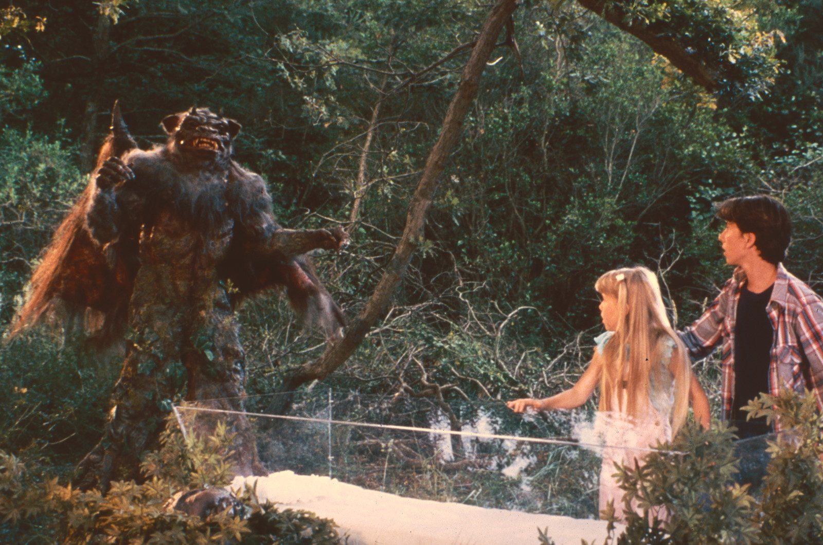 An image of Tritar approaching Jenny Beck in Noah Hathaway in Troll for the guide on how to watch the Troll movies in order.