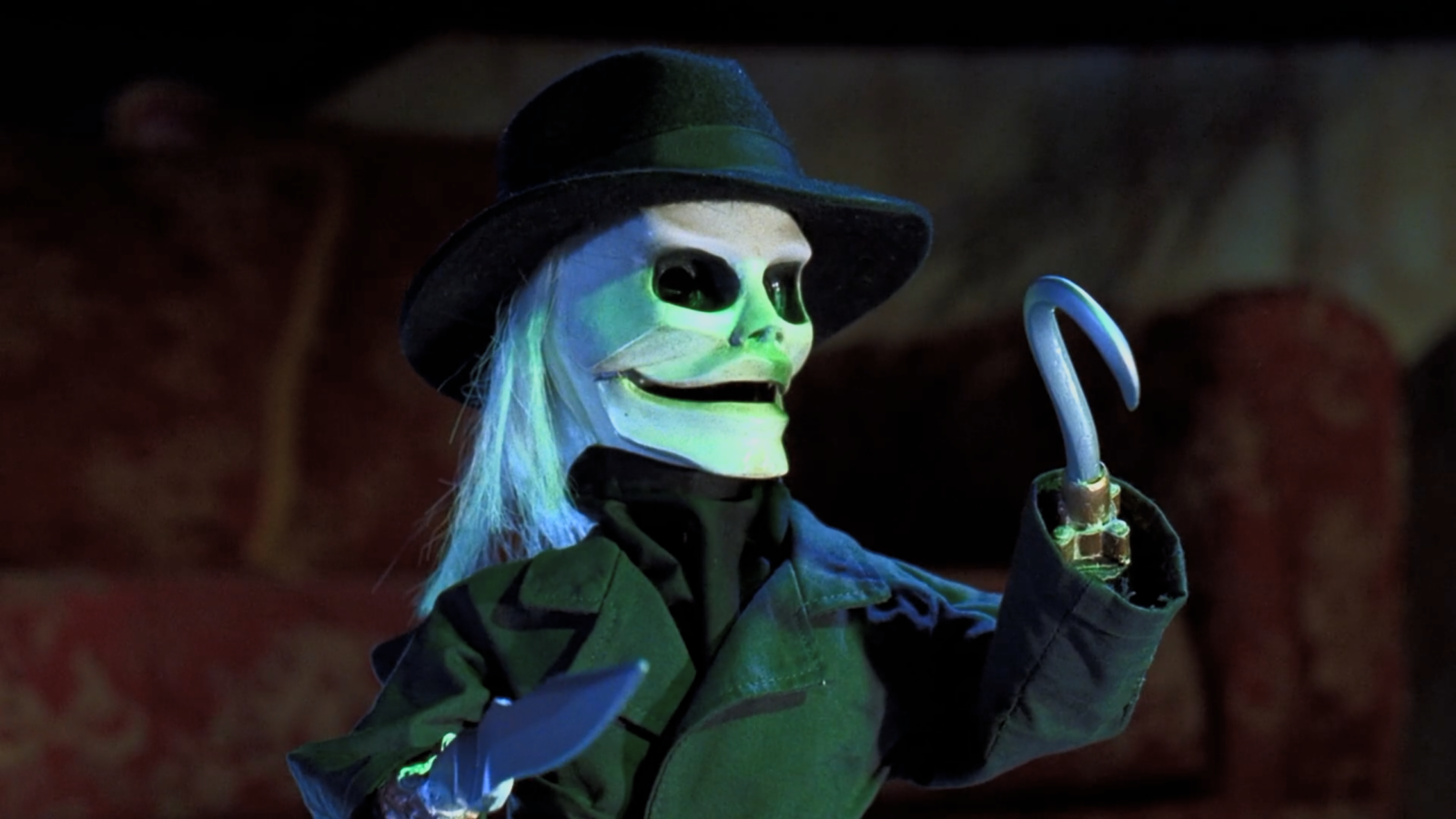 Blade holding his knife and hook in Puppet Master 5, featured in our Puppet Master reboot timeline.